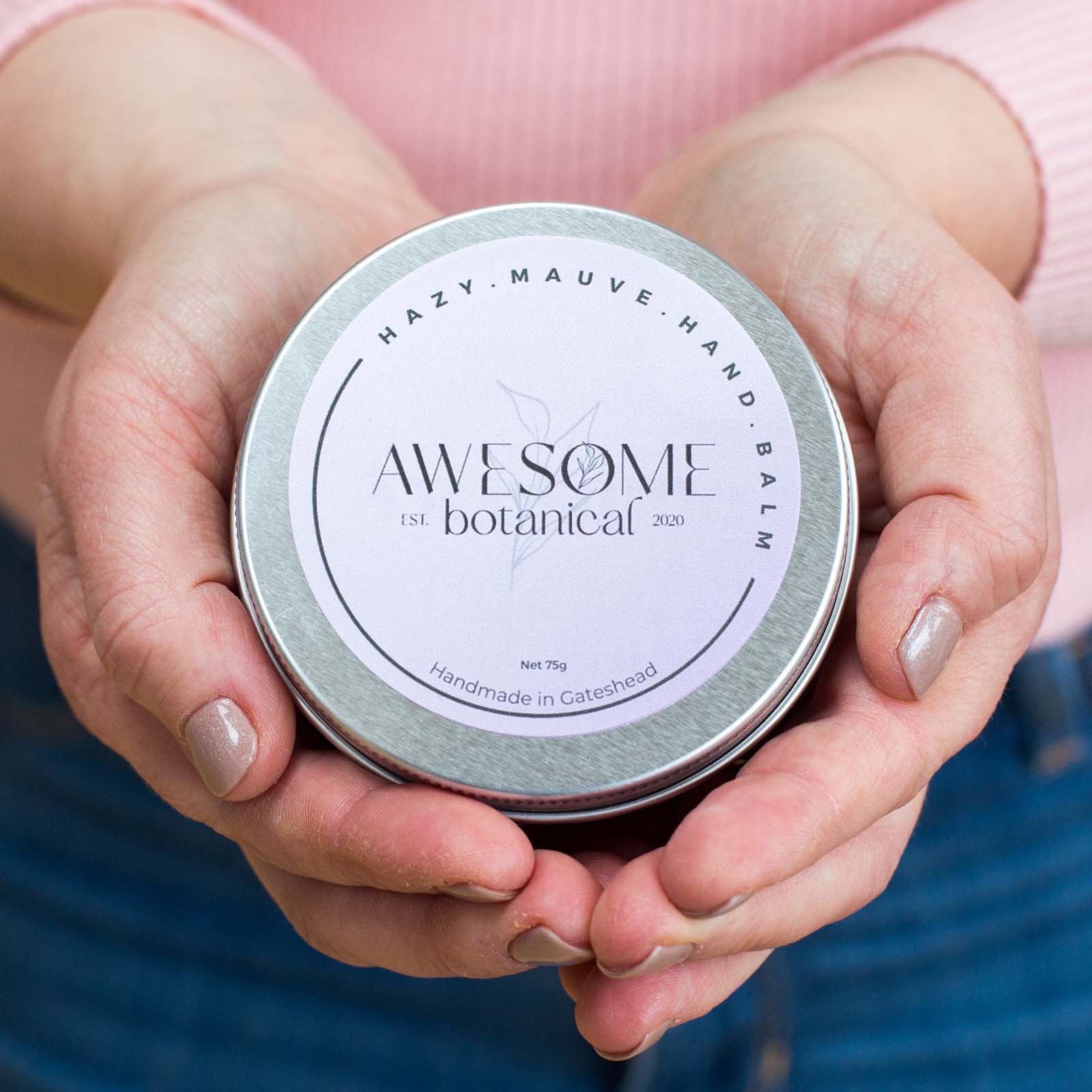 Hazy Mauve 75g hand balm in tin in hands