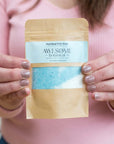 Humbug Epsom Salt Foot Soak in hands