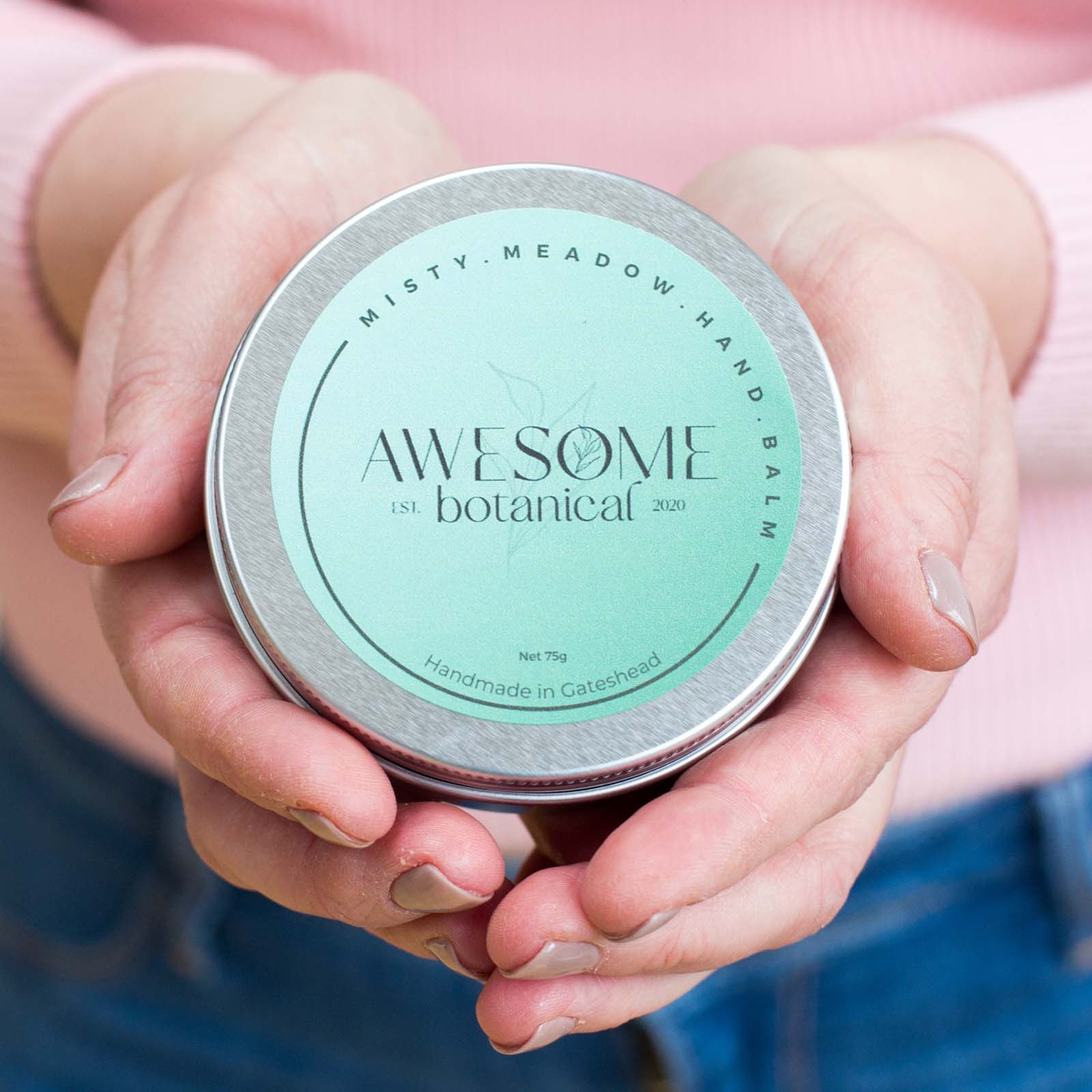 Misty Meadow Hand Balm 75g in hands closed tin