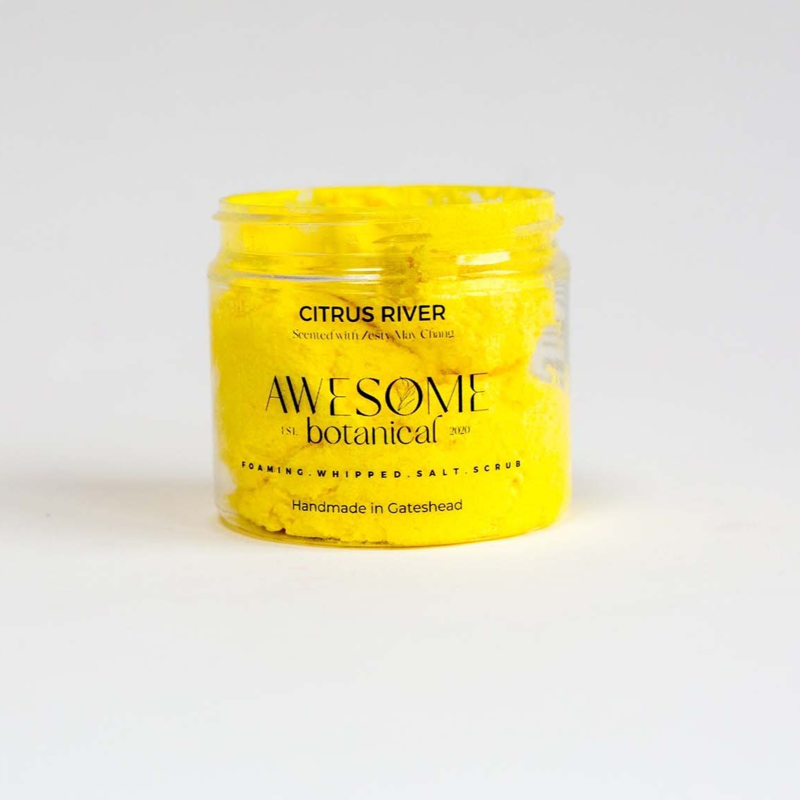 Citrus River Yellow Salt Body Scrub on white background