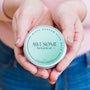 Misty meadow hand balm 20g in hands closed tin