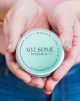 Misty meadow hand balm 20g in hands closed tin