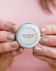Nail & cuticle balm in hands
