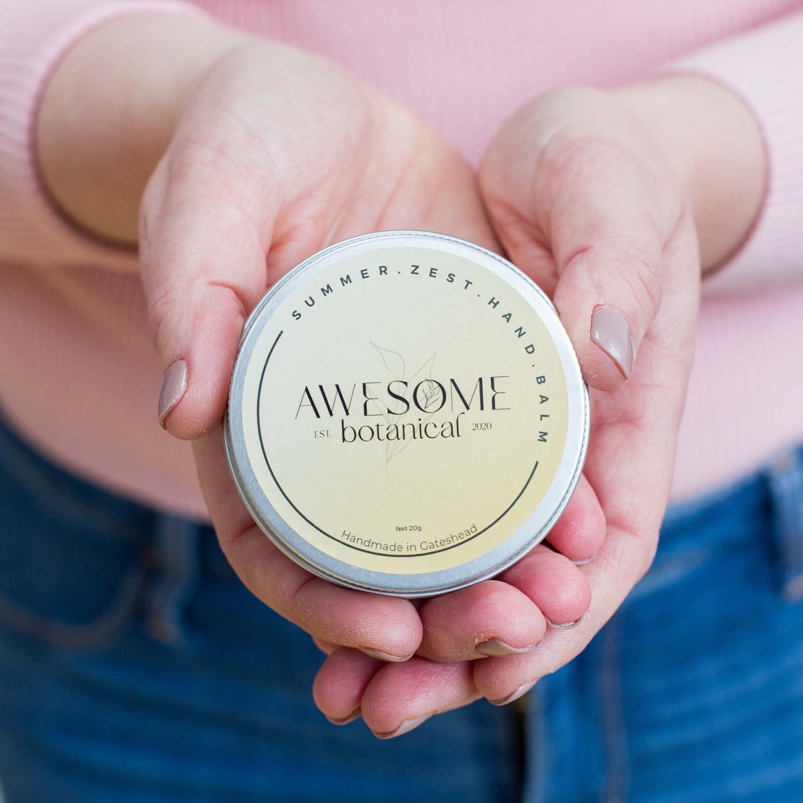 Summer Zest Hand Balm in tin 20g in hands