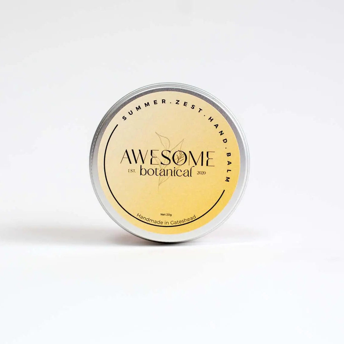 Summer Zest Hand Balm in tin 20g on white back ground