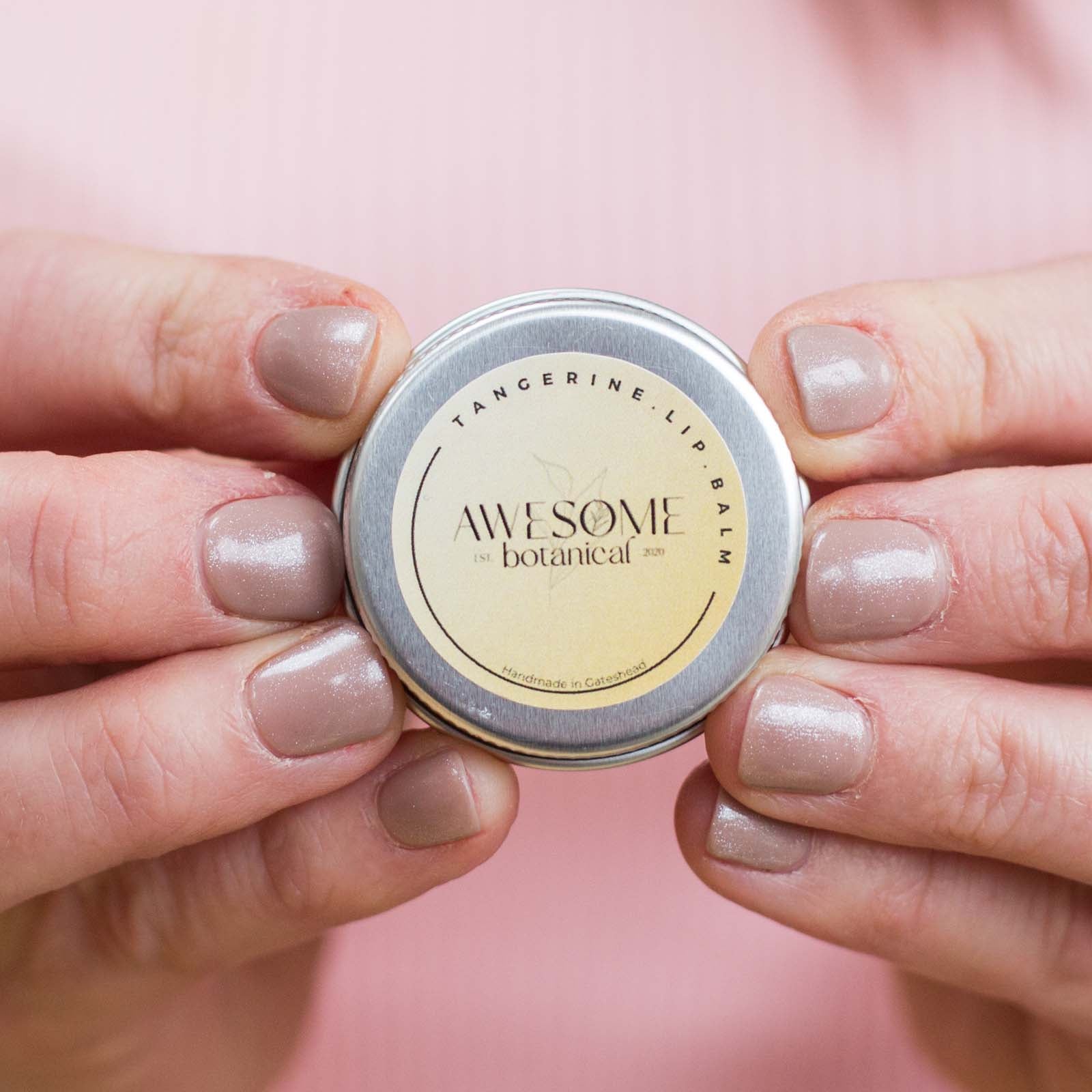 Tangerine Lip Balm in hands