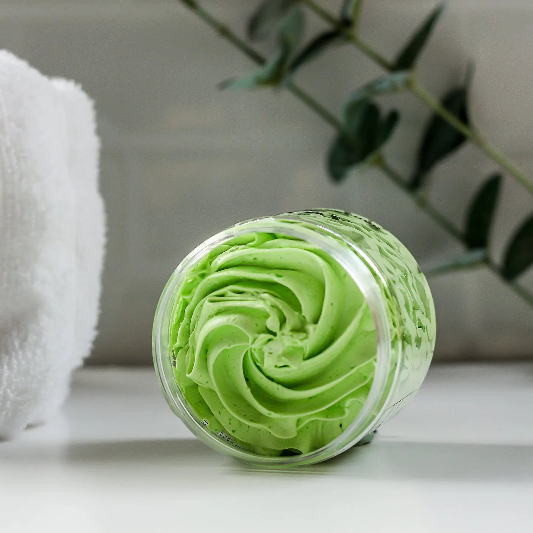  Proppa Mint Shower butter in bathroom with plant and towel